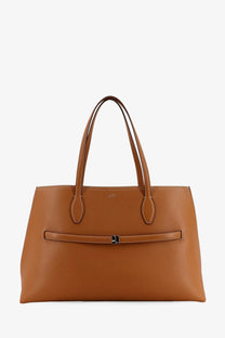 Tan pebbled leather tote bag with central metallic clasp and matching handles from Toteme womens leather shoulder bag beige