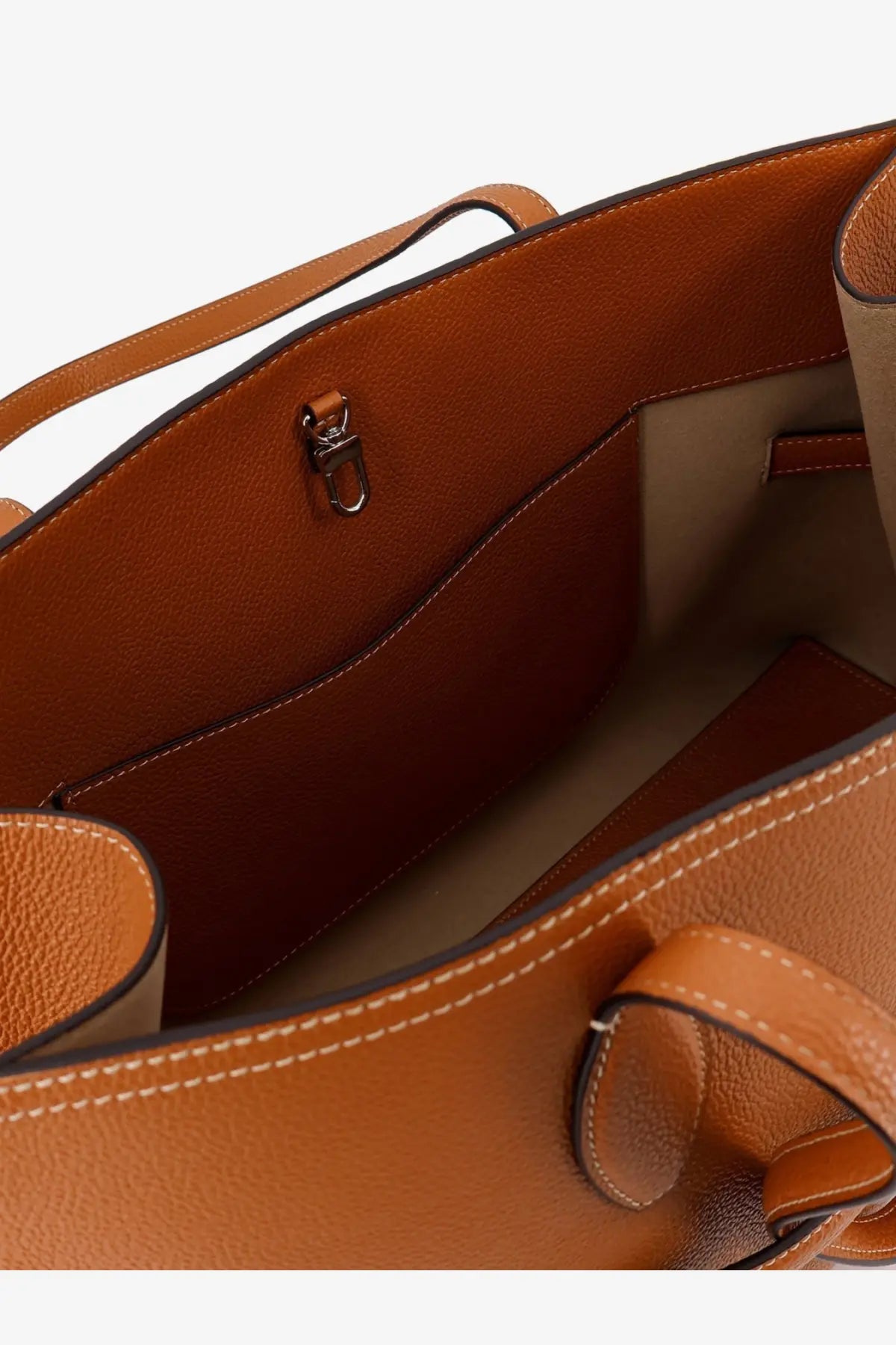 Toteme women’s leather shoulder bag in tan with beige interior and white stitching designed as a tote bag