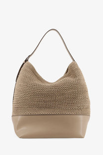 Beige woven straw shoulder bag with smooth leather base and handle by Toteme for women