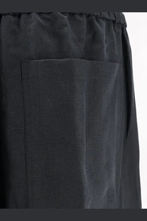 Toteme women’s black linen and lyocell blend trousers with elastic waistband and subtle textured weave