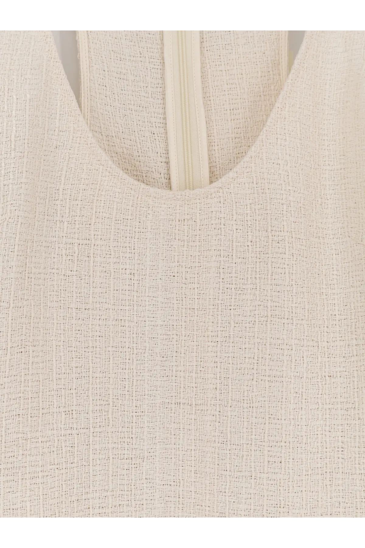 Beige textured linen top with central zipper neckline detail in Toteme women’s long white cotton dress