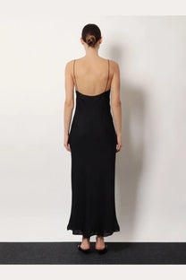 Toteme women’s long black silk dress with black satin slip backless design and thin spaghetti straps