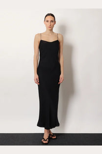 Toteme women’s long black silk dress with spaghetti straps and sleek flowing silhouette