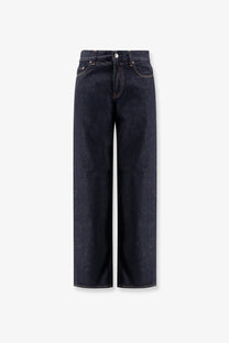Toteme women’s low straight denim jeans in dark indigo with a high-rise waist and wide-leg cut