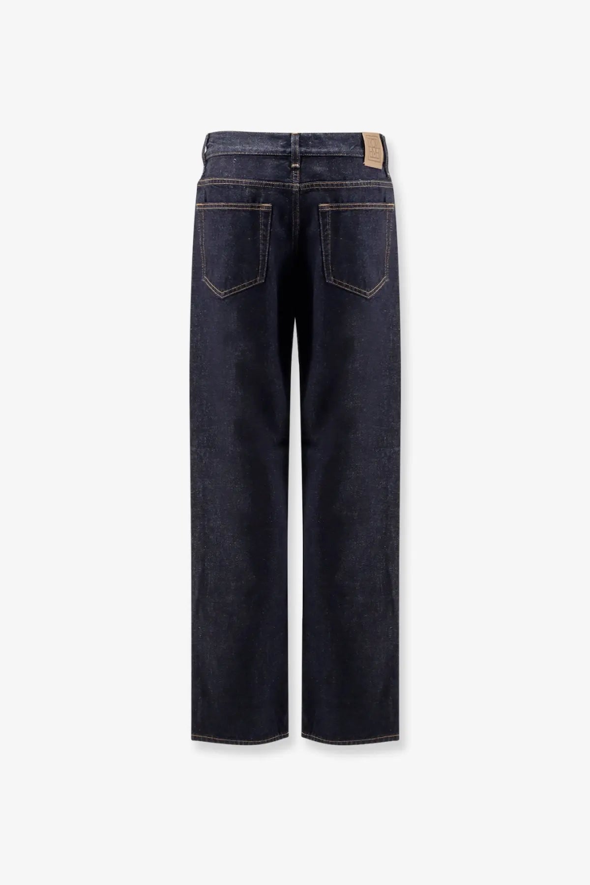 Dark indigo Toteme women’s low straight denim jeans with contrasting light stitching and a straight-leg cut