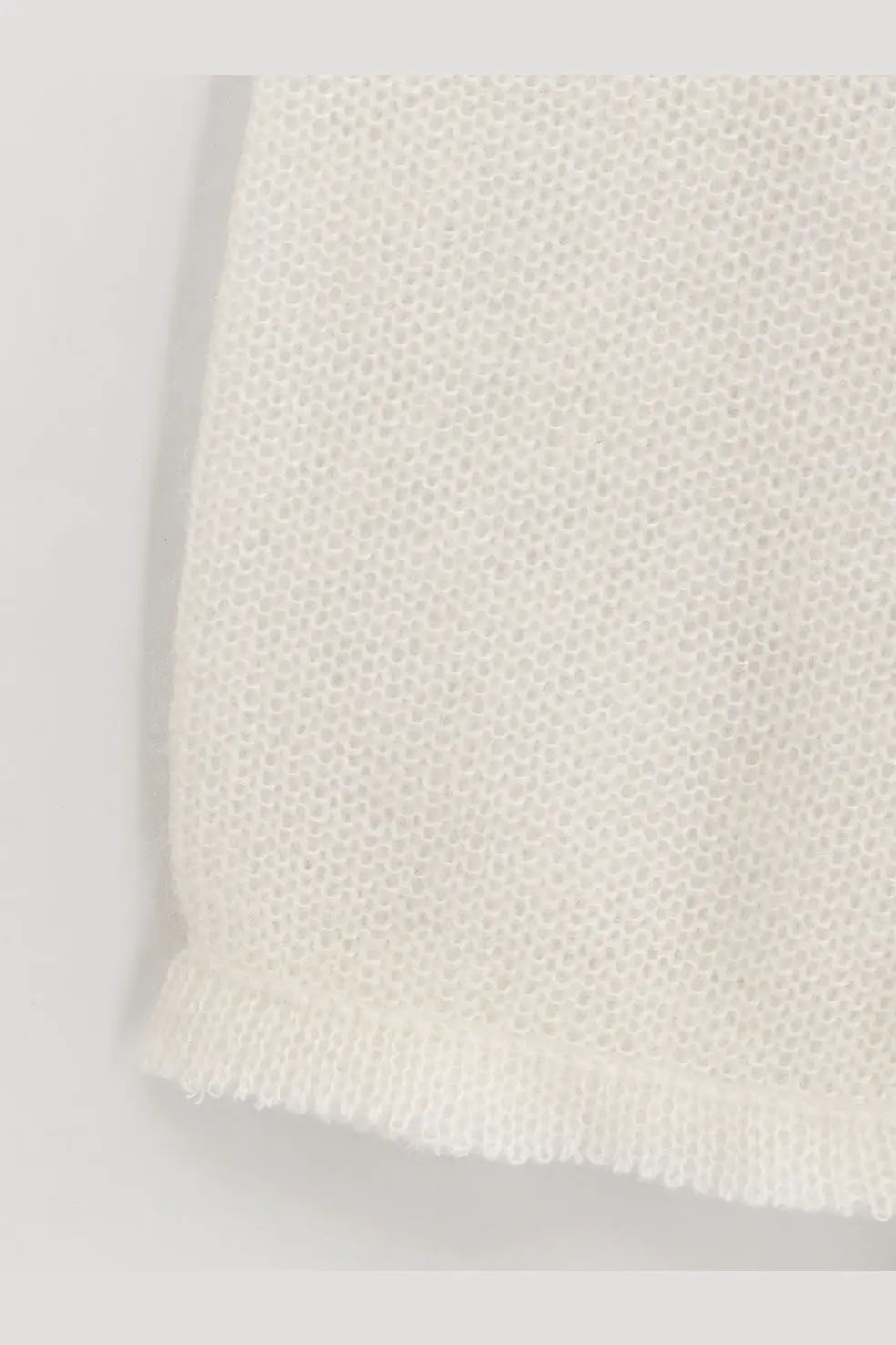 Delicate off-white toteme women’s mohair and wool blend sweater with fine mesh knit and softly frayed edges