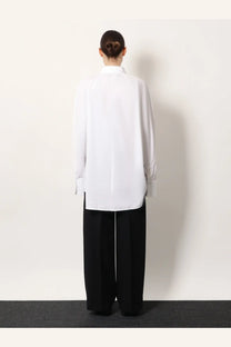 Toteme women’s organic cotton white oversized button up shirt with long sleeves and classic collar