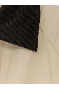 Black corduroy collar with ribbed texture on beige toteme women’s organic cotton summer country jacket