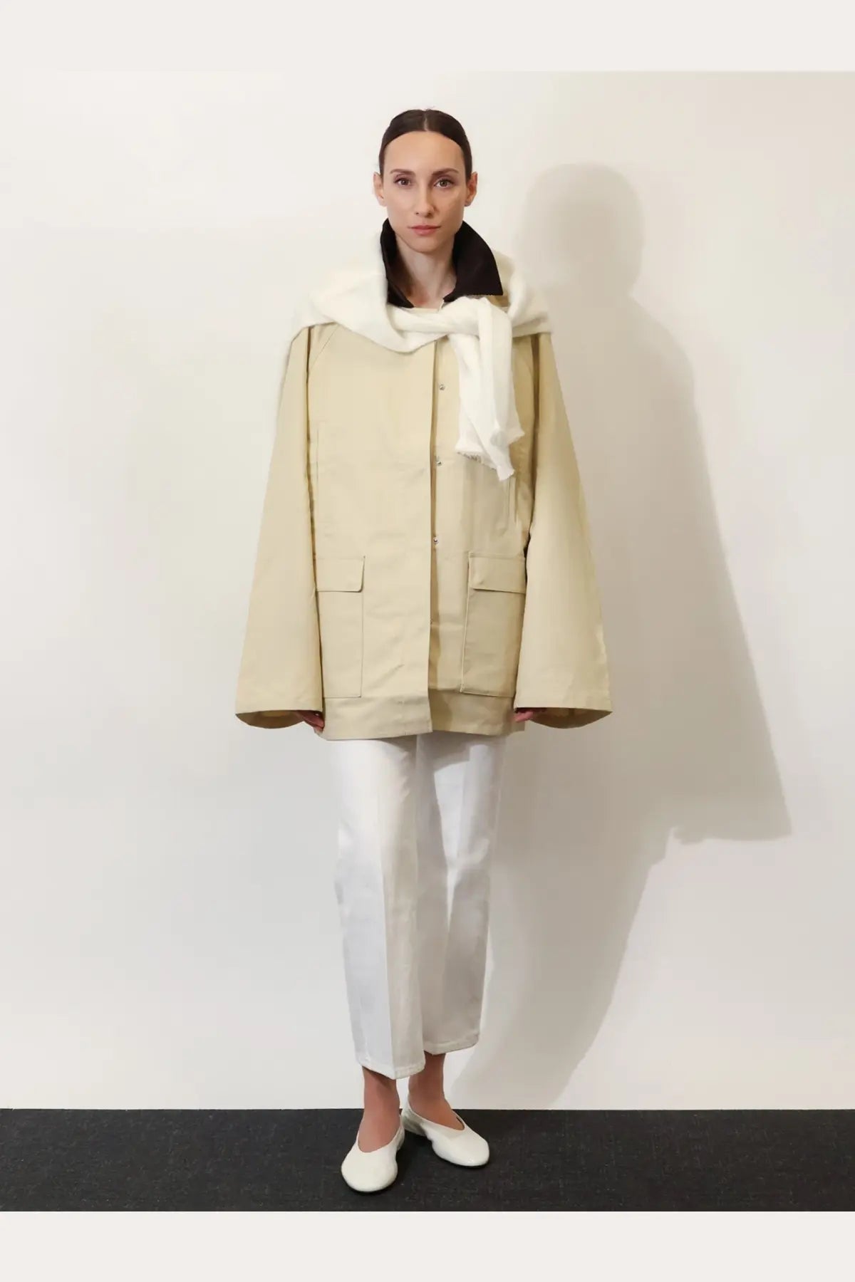 Toteme women’s beige organic cotton summer country jacket with utility style and plush white scarf over shoulders