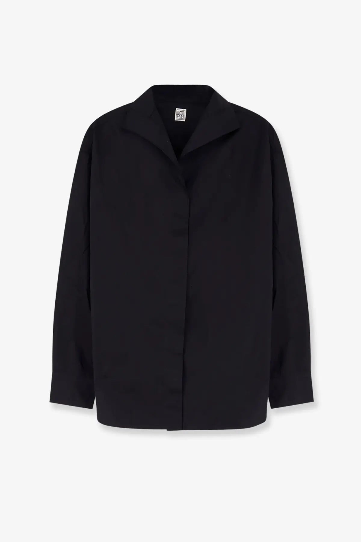Toteme women’s oversized black cotton shirt with a structured collar and long sleeves in minimalist design
