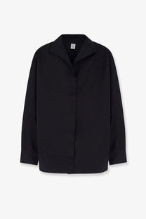 Toteme women’s oversized black cotton shirt with a structured collar and long sleeves in minimalist design
