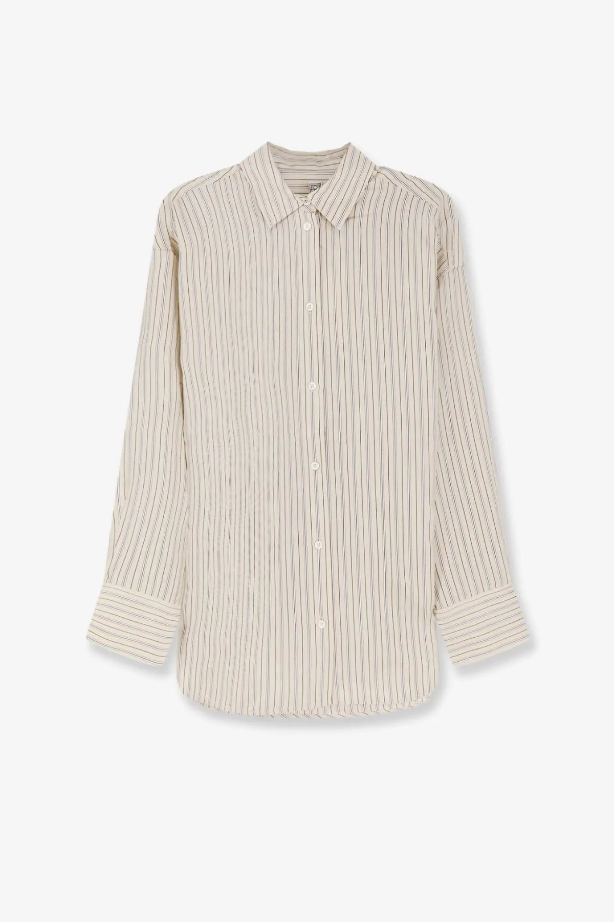 Toteme women’s oversized striped silk shirt in beige with black vertical stripes, classic collar, and long sleeves