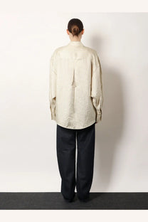 Toteme women’s oversized silk shirt in beige with subtle vertical stripes and a relaxed fit