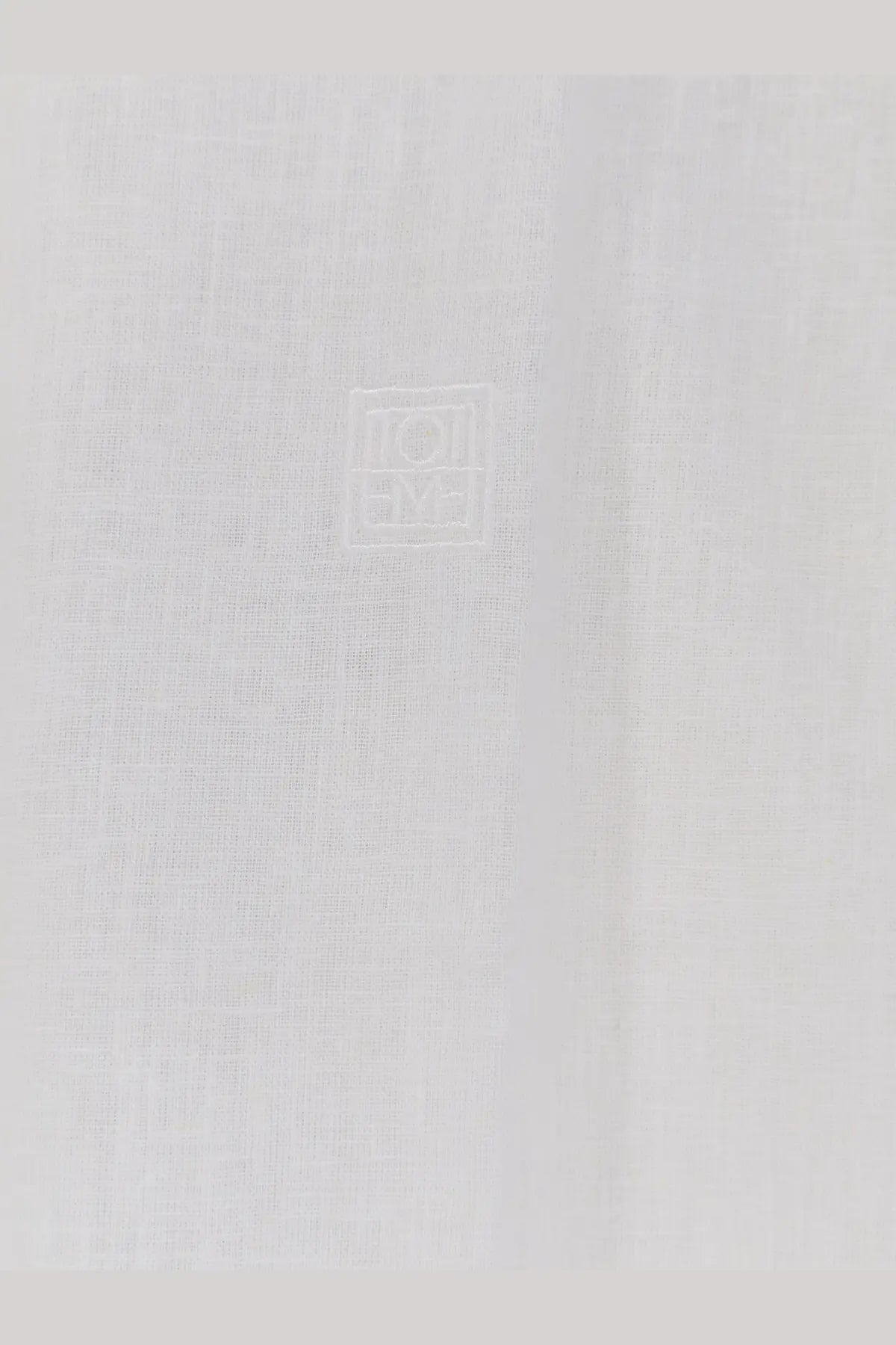 Toteme women’s oversized summer cotton and linen shirt white featuring white linen fabric with subtle embroidered square logo