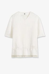 Toteme women’s off-white satin pullover top with v-neck short sleeves and ruffled hem with vertical seam detail