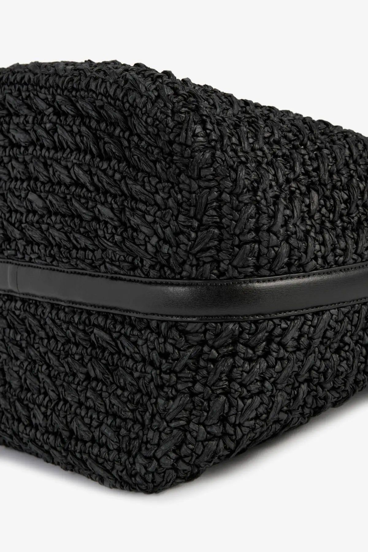 Toteme women’s black woven straw tote bag with sleek leather strap and raffia shoulder design for stylish carrying