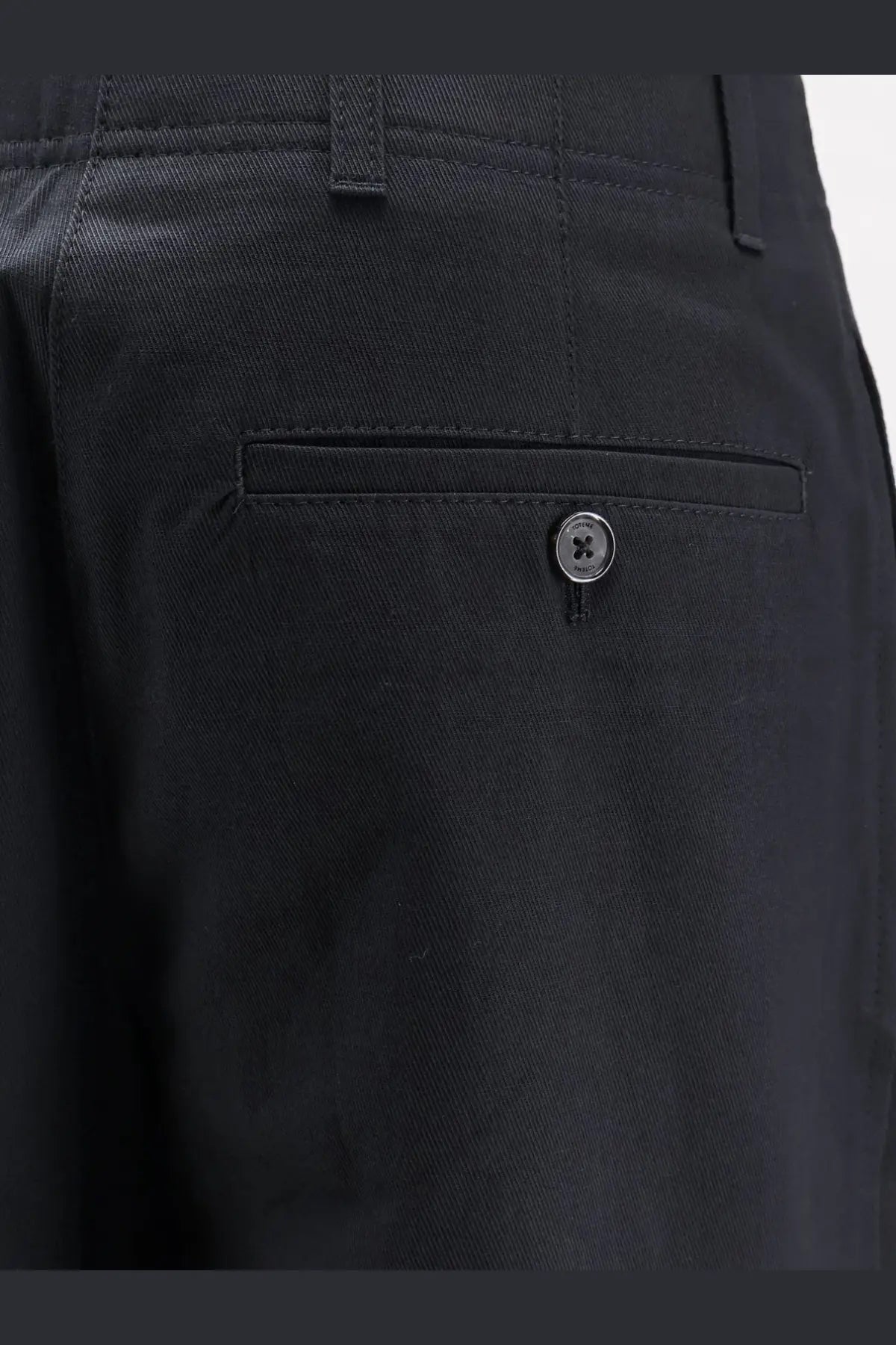 Toteme women’s relaxed black cotton denim chino trousers with subtle twill weave and single button front pocket closure