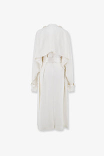 Toteme women’s satin trench coat in white with a belted waist and layered ruffled sleeves