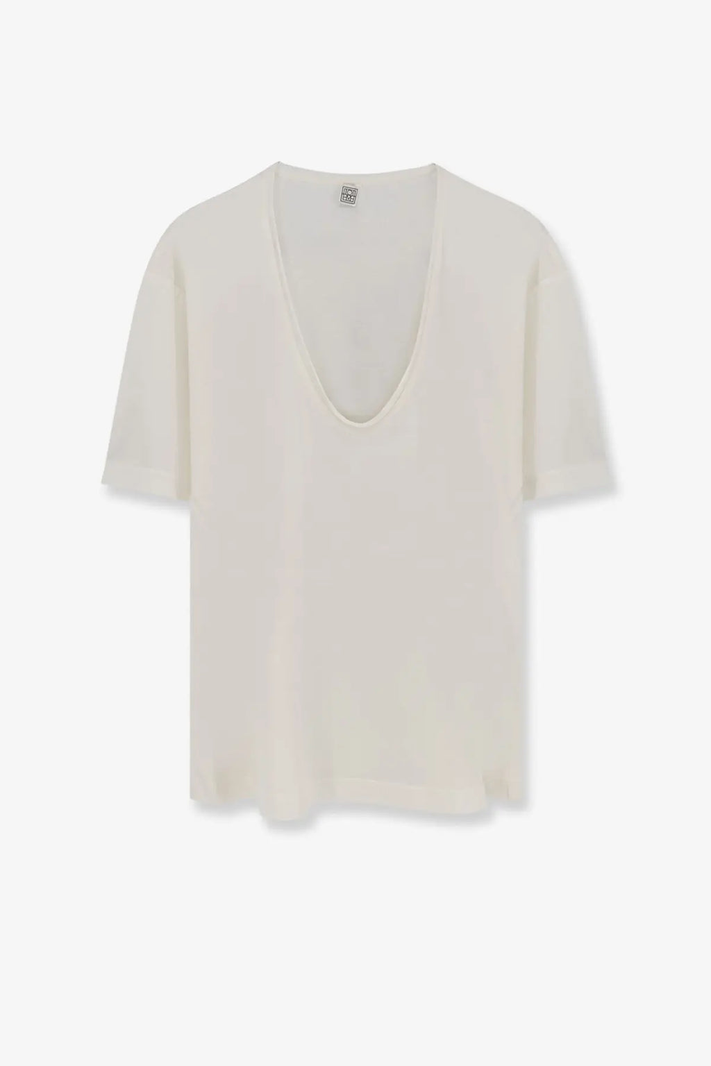 Cream-colored Toteme women’s silk and cotton blend lightweight short-sleeved top with deep v-neckline