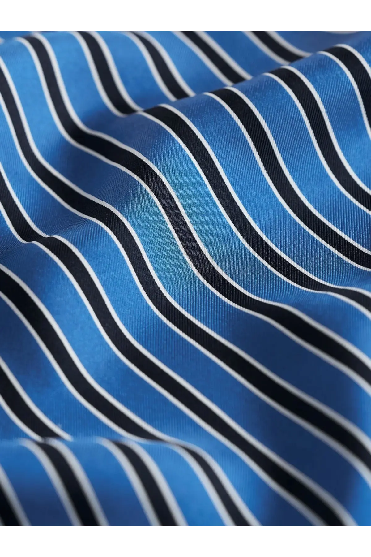 Toteme women’s silk foulard blue with bold black and white wavy stripes made of luxurious silk fabric