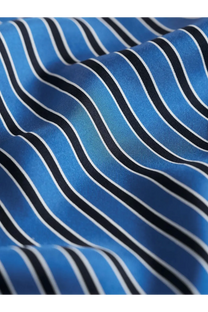 Toteme women’s silk foulard blue with bold black and white wavy stripes made of luxurious silk fabric