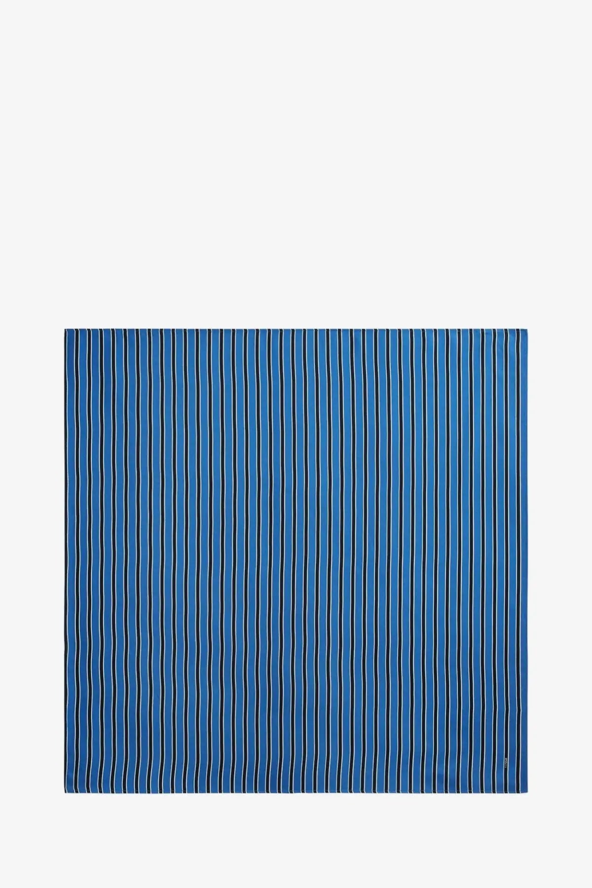 Toteme women’s silk foulard in blue with thin white vertical stripes showing a blue striped scarf design