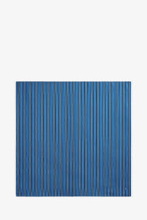 Toteme women’s silk foulard in blue with thin white vertical stripes showing a blue striped scarf design