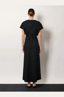 Toteme women’s black wool maxi dress with flutter sleeves and fitted waist made from smooth fabric