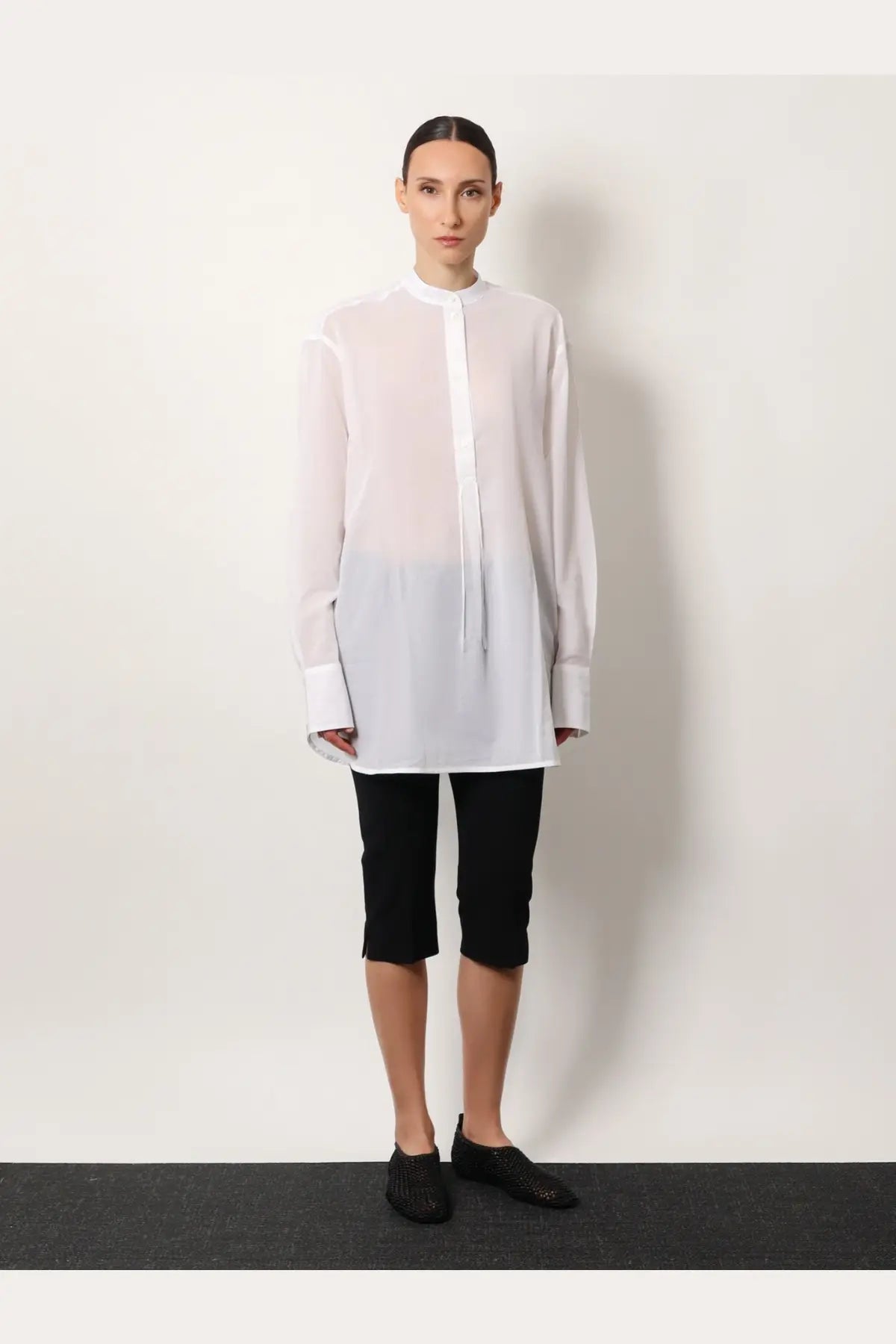 Toteme women’s white organic cotton sheer blouse with stand collar gradient transitioning to solid white hem
