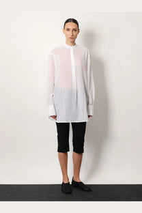 Toteme women’s white organic cotton sheer blouse with stand collar gradient transitioning to solid white hem
