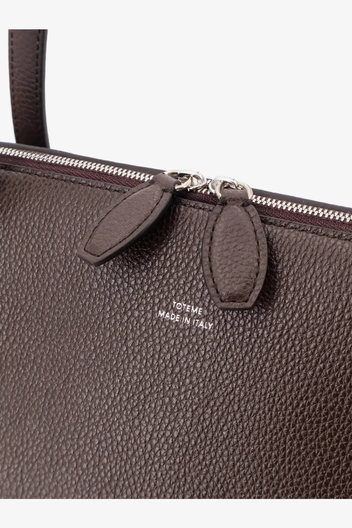 Toteme women’s brown suede tote bag with textured leather, silver zipper, and embossed made in Italy logo on front