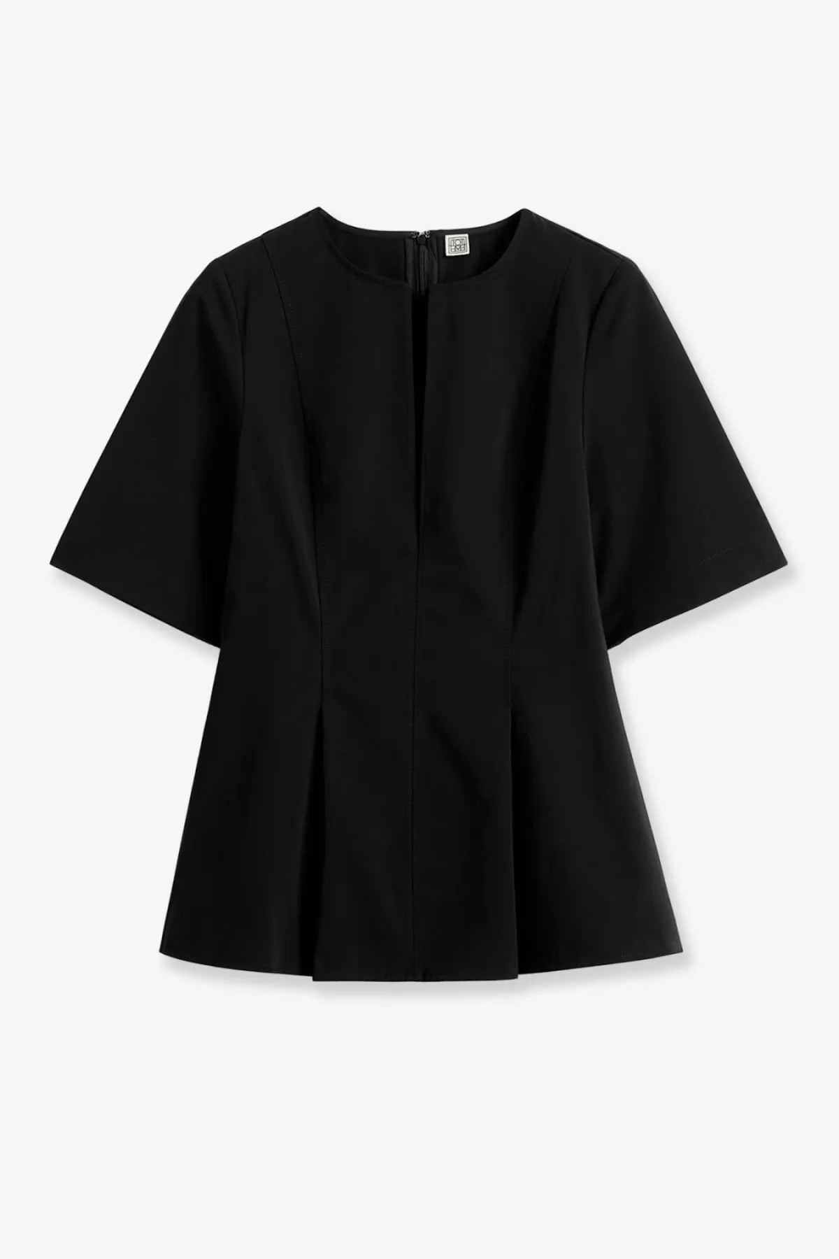 Black cotton peplum top for women by toteme shown from back with short sleeves and central back zipper