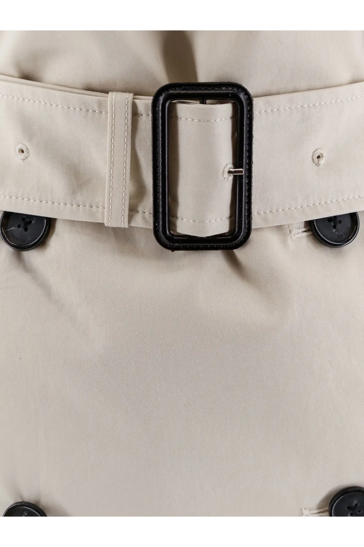 Toteme women’s trench washed cotton beige trench coat with black rectangular buckle and matching black buttons