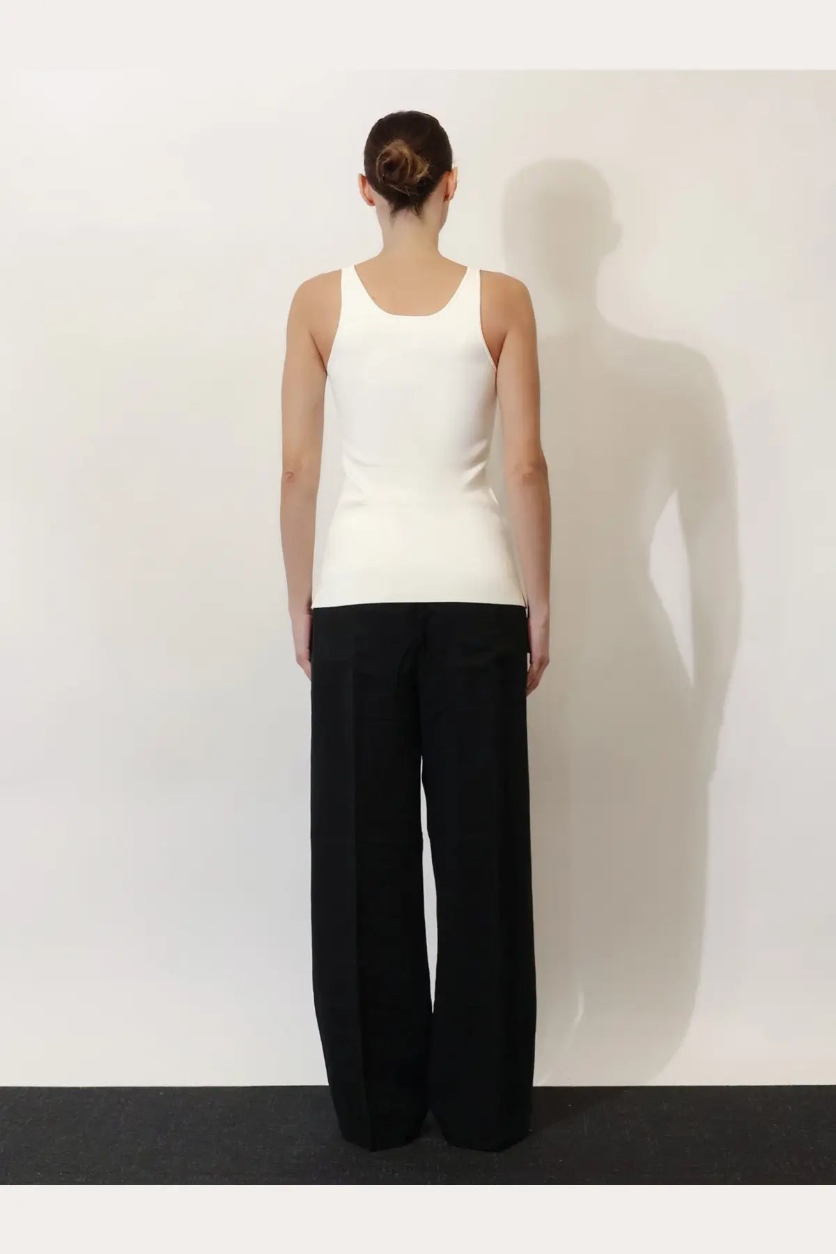 Toteme women’s white viscose blend tank top with a minimalist sleeveless design and rounded neckline