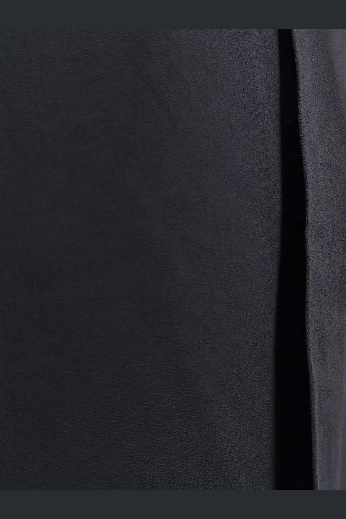 Toteme women’s viscose blend trouser in black with soft black suede fabric featuring a smooth, textured surface and subtle sheen