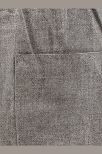 Gray heathered viscose fabric pocket with subtle woven texture on Toteme women’s trousers back side