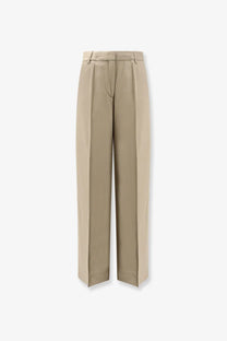 Beige high-waisted wide-leg trousers by toteme made of viscose and wool with a tailored clean design