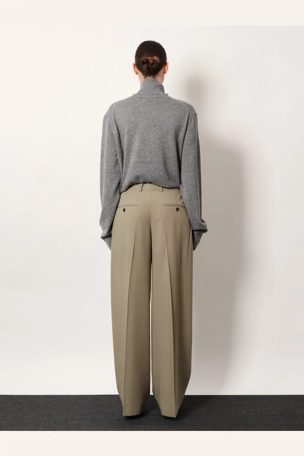 Toteme women’s beige wide-leg pleated trousers made from viscose and wool with tailored fit and buttoned front pockets