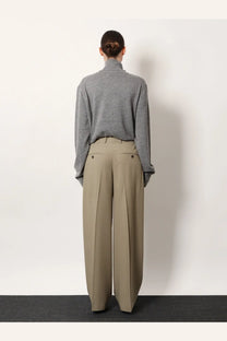 Toteme women’s beige wide-leg pleated trousers made from viscose and wool with tailored fit and buttoned front pockets