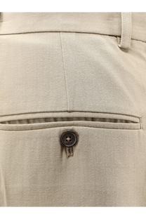 Toteme women’s beige cotton trousers with textured fabric dark brown button and subtle stitching details