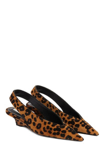 Toteme women’s wedge slingback pumps in caramel leopard-print suede with black interior lining displayed from the back
