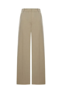 Beige high-waisted wide-leg wool blend tailored pants for women by Toteme with a sleek tailored design