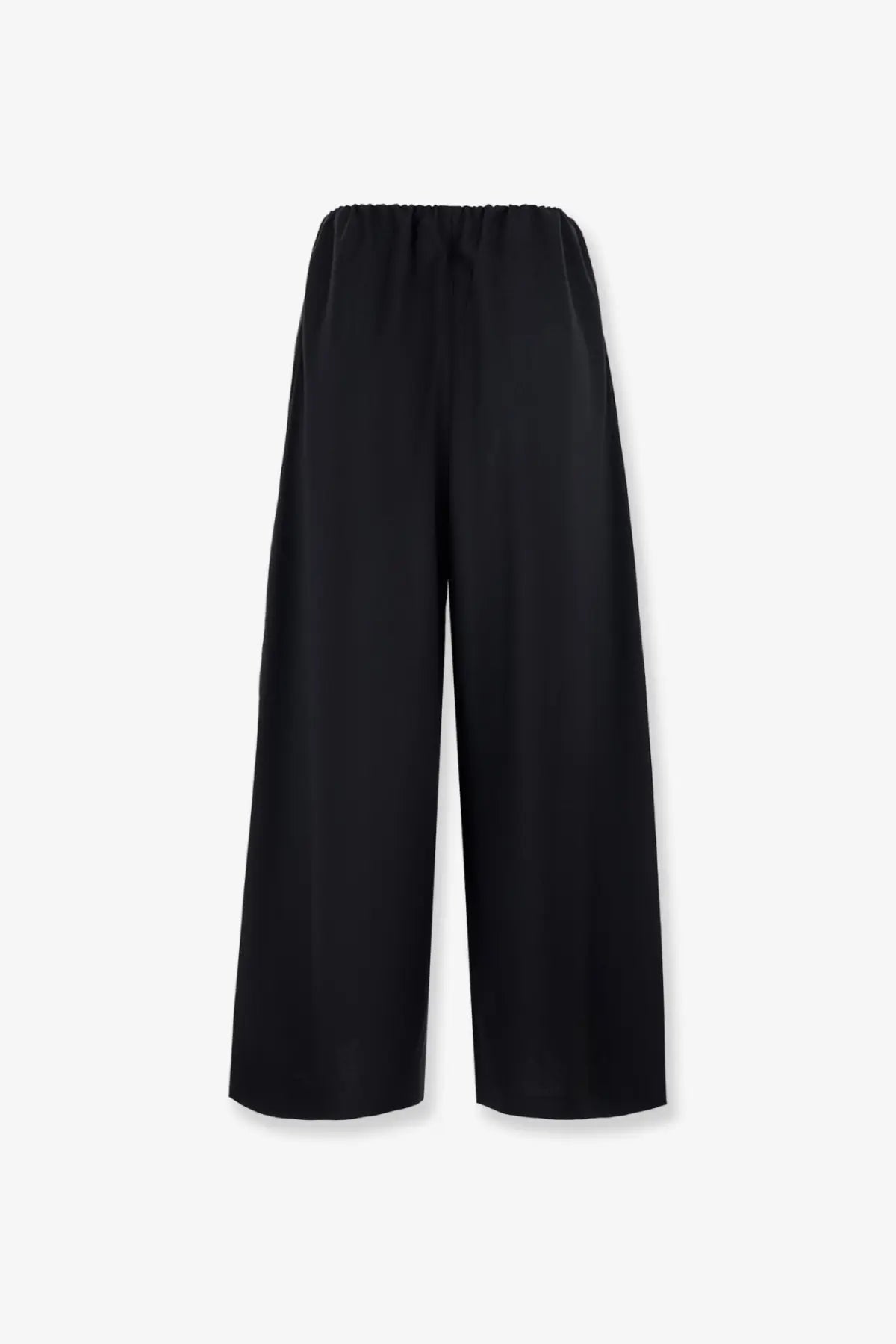 Black wide-leg wool trousers with elastic waistband from Toteme women’s collection shown from the front