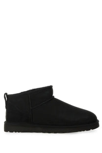 Ugg men’s classic ultra mini black boot with suede upper and plush lining for comfortable wear
