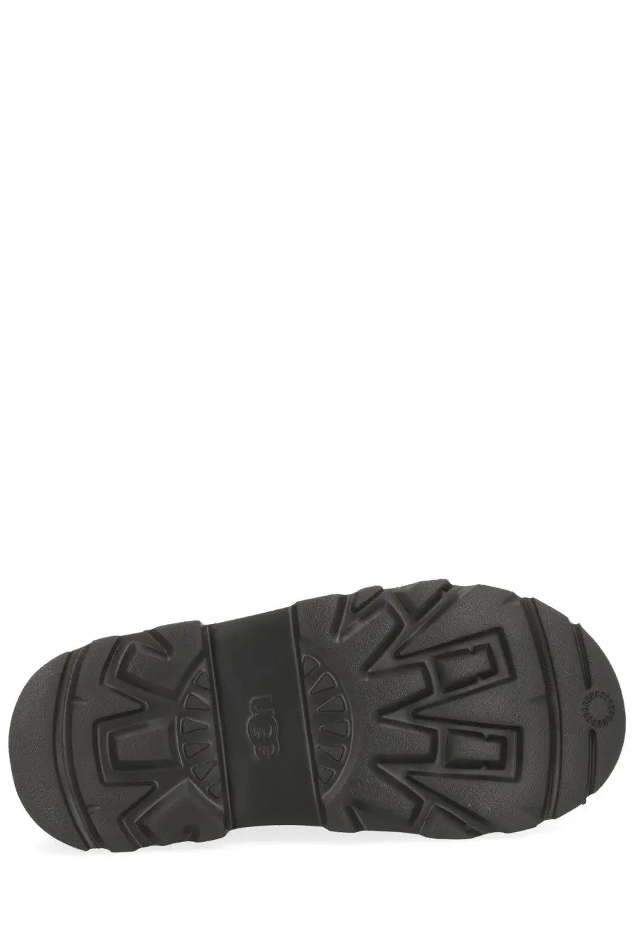 Black rubber sole with embossed ugg logo and geometric tread pattern on ugg men’s chelsea lug boot brown