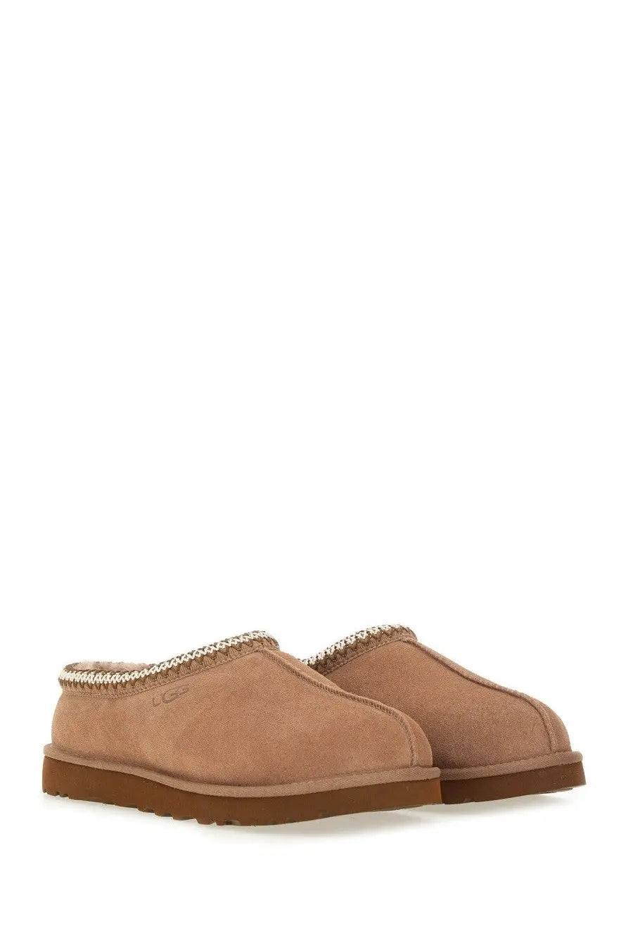 Ugg men’s slipper tasman brown tan suede slip-on mules with braided trim and brown rubber sole front view