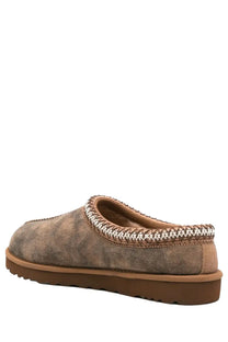 Ugg men’s tasman baxter brown suede slip on mule shoe with braided trim detail along the opening