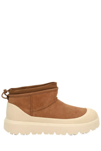 Ugg men’s ultra mini weather hybrid boots in brown tan suede with cream rubber sole and textured toe cap front view