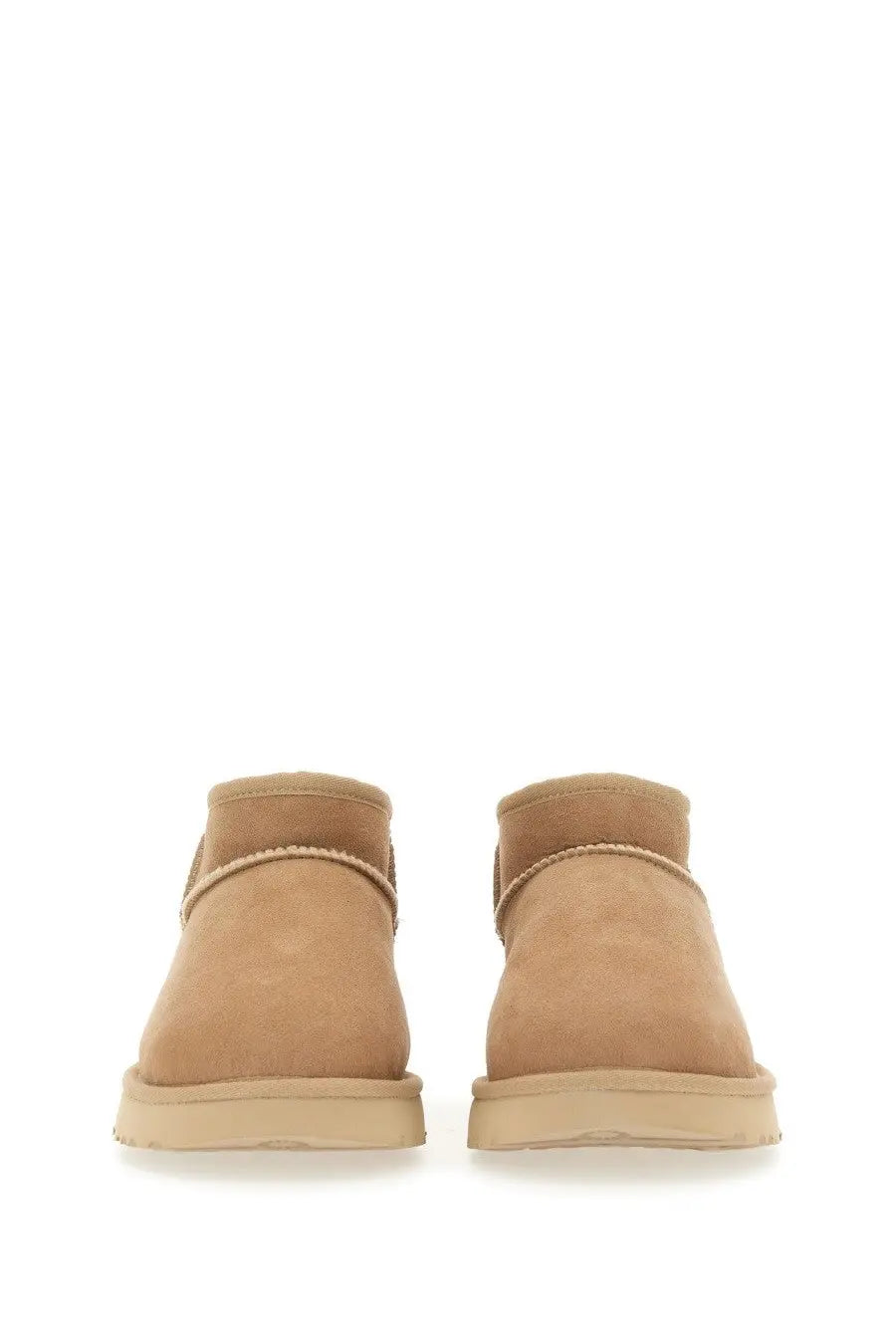 Ugg women’s boot classic ultra mini beige tan suede booties with soft plush interior and matching rubber soles