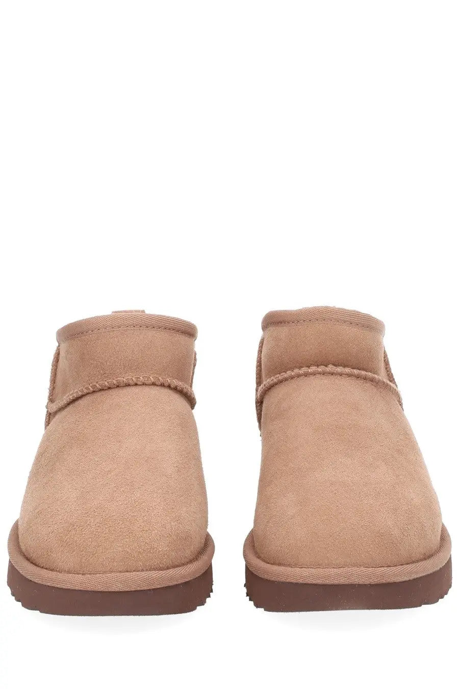 Ugg women’s classic ultra mini beige tan suede booties with stitched rope detail around the ankle